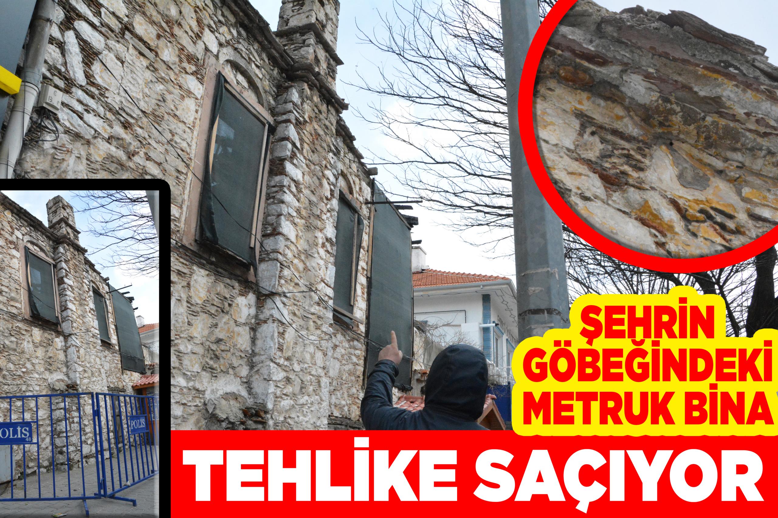 ŞEHRİN GÖBEĞİNDEKİ METRUK BİNA TEHLİKE SAÇIYOR