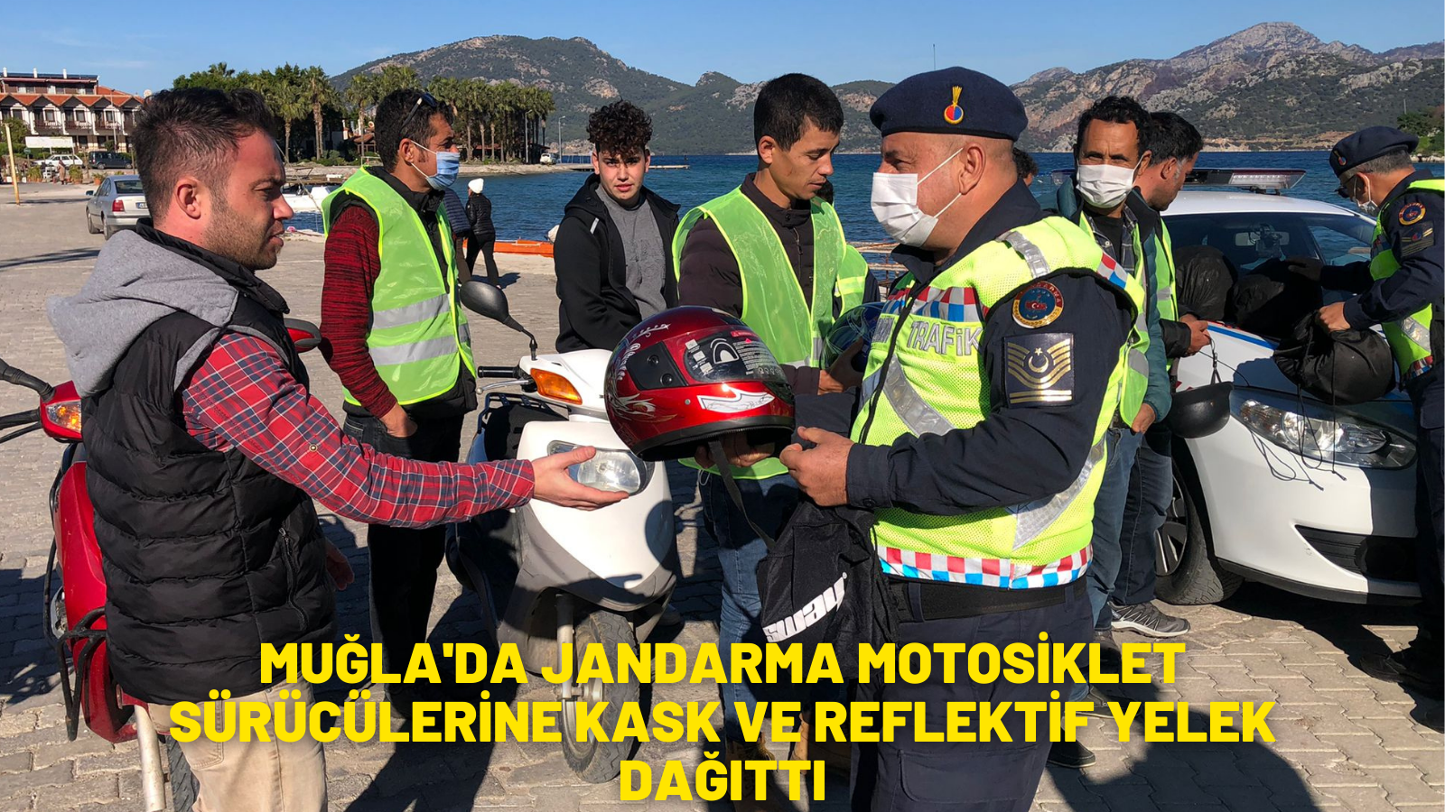 Muğla'da jandarma motosiklet sürücülerine kask ve reflektif yelek dağıttı