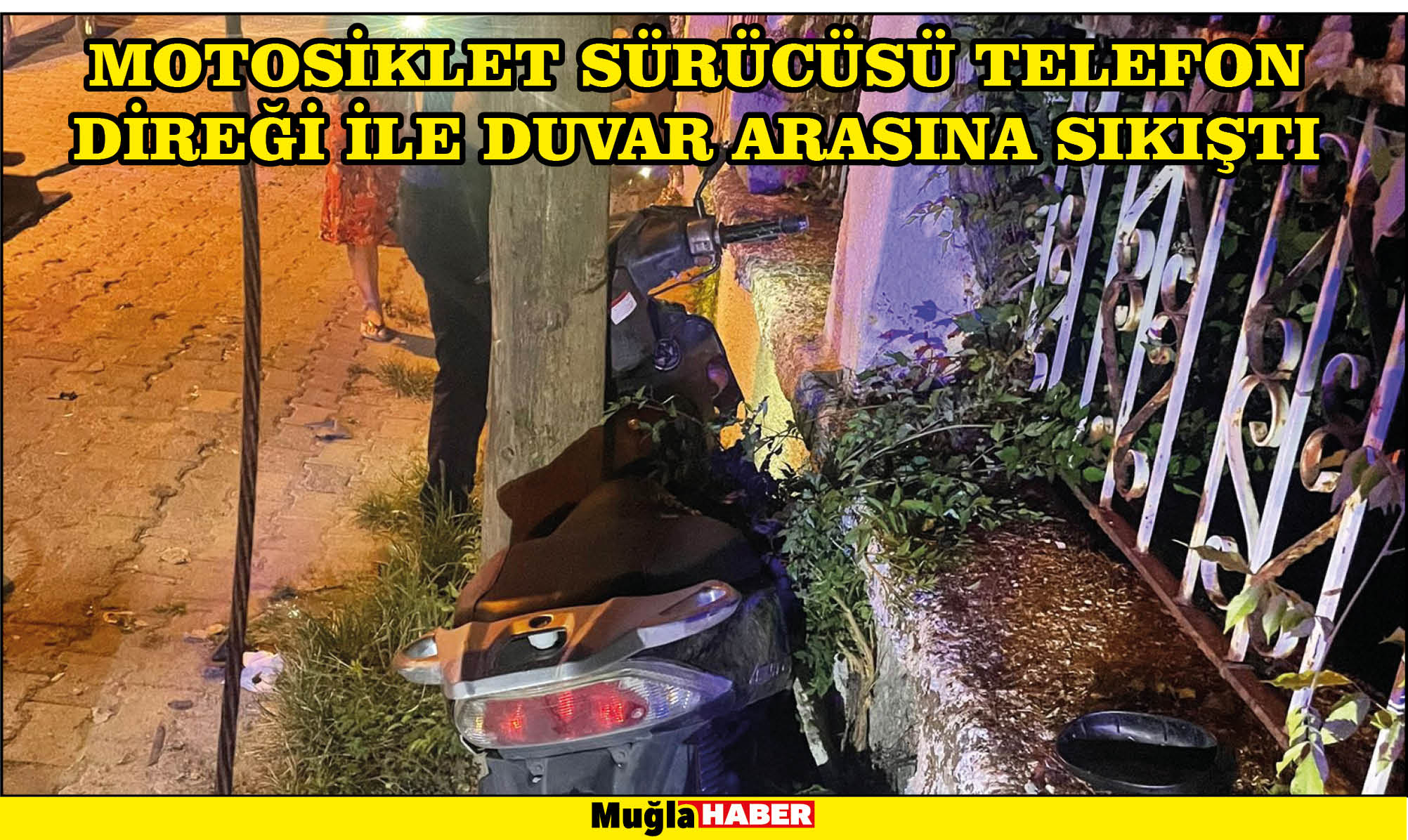 MOTOSİKLET SÜRÜCÜSÜ TELEFON DİREĞİ İLE DUVAR ARASINA SIKIŞTI