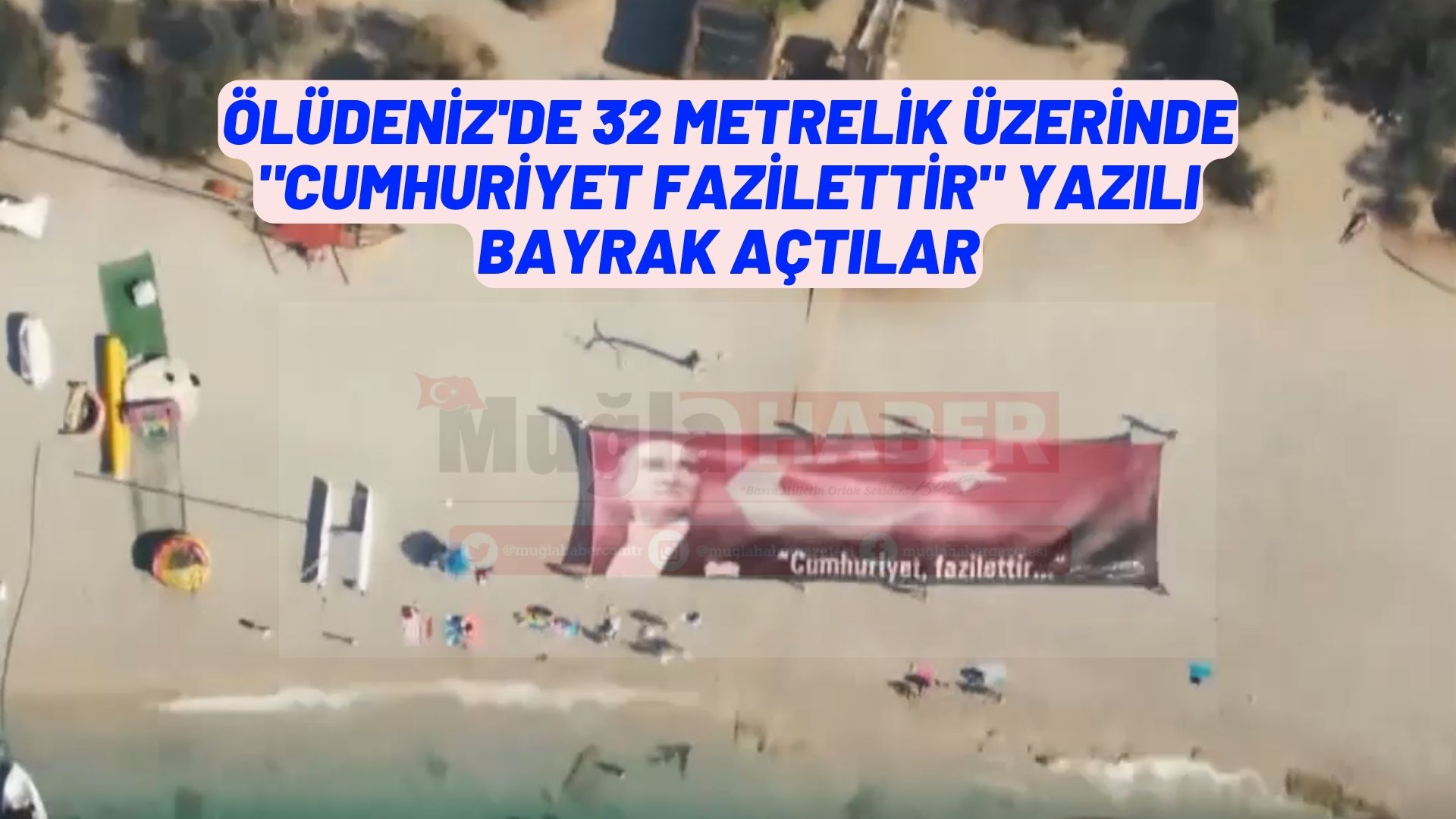 ÖLÜDENİZ'DE 32 METRELİK ÜZERİNDE "CUMHURİYET FAZİLETTİR" YAZILI BAYRAK AÇTILAR