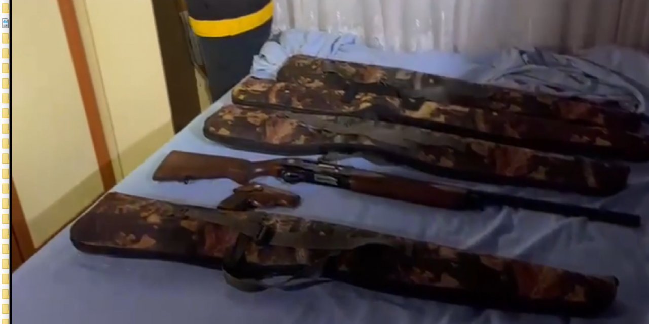 Marmaris'te evinde 21 tüfek ve 8 tabanca ele geçirilen zanlı tutuklandı