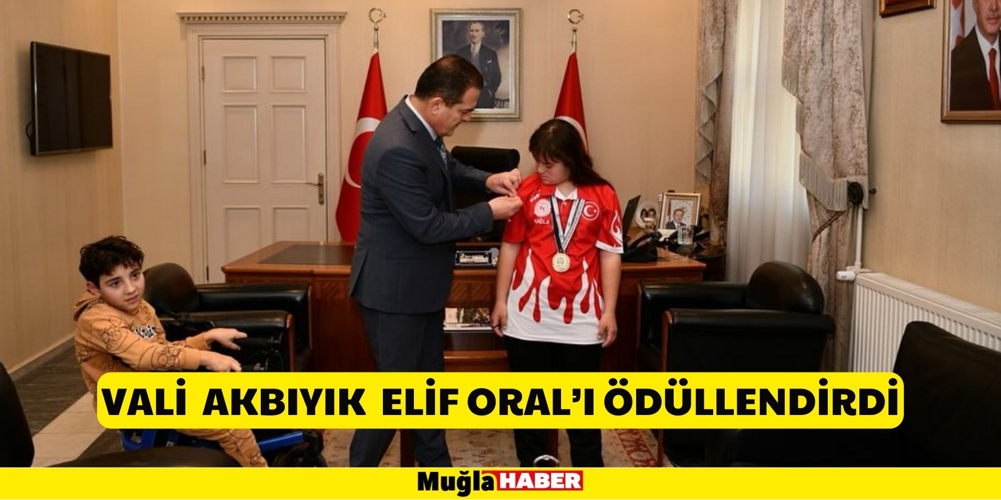 VALİ  AKBIYIK  ELİF ORAL’I ÖDÜLLENDİRDİ