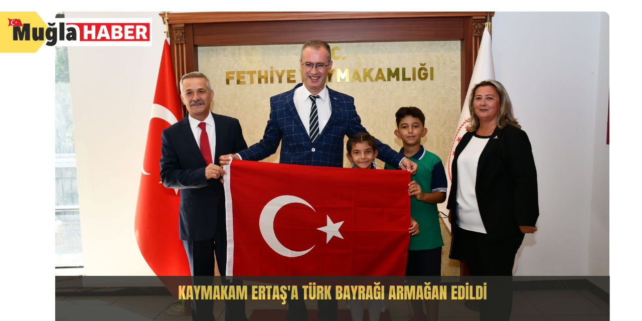 Kaymakam Ertaş'a Türk bayrağı armağan edildi