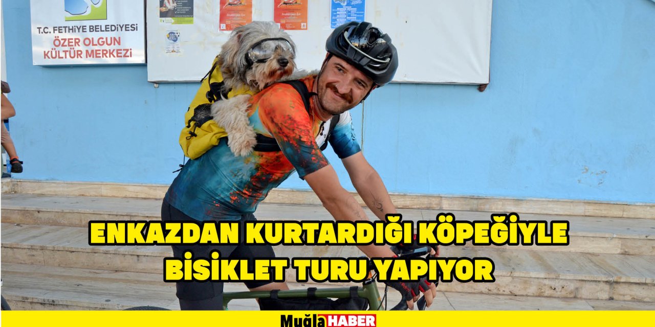 ENKAZDAN KURTARDIĞI KÖPEĞİYLE BİSİKLET TURU YAPIYOR